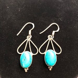Turquoise colored stone and real silver earrings